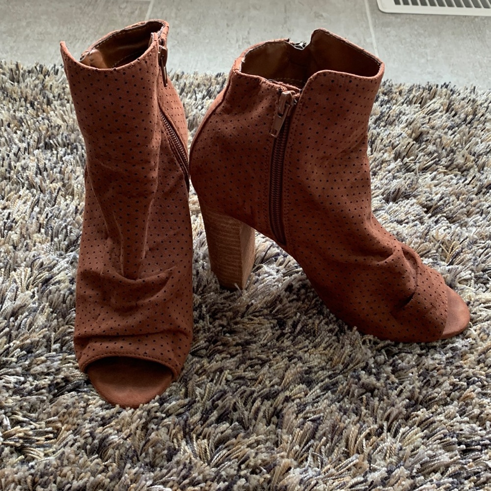 Express peep toe heels in rich brown color. Side zip